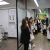 Incoming D1 students participating in clinic tour led by dental student on Welcome Day
